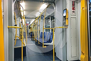 An empty tram with no people in the cabin