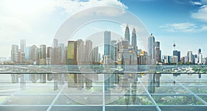 Empty transparent glass floor with city