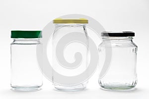 Empty transparent glass jars with lids