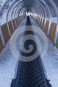 Empty travelator at the ski resort