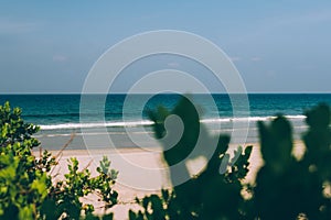 Empty tropical beach background blue sea and blue sky background. Summer Vacation Travel and Holiday concept. Copy space for promo