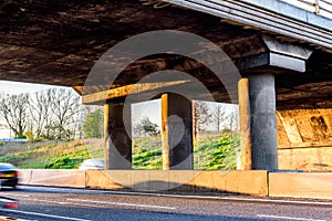 Empty UK Motorway under junction bridge evening