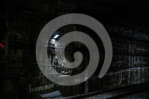 Empty underground train tunnel. Malaga, Spain - March 3, 2020: