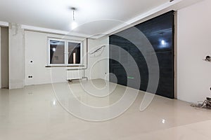 Empty unfurnished room with minimal preparatory repairs. interior with white walls