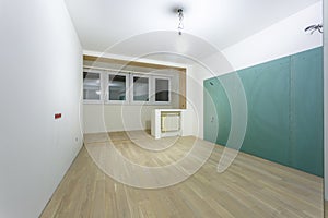 Empty unfurnished room with minimal preparatory repairs. interior with white walls