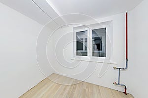 Empty unfurnished room with minimal preparatory repairs. interior with white walls