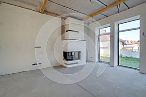 Empty unfurnished room with minimal preparatory repairs. interior with white walls and drywall