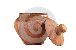 Empty unpainted clay pot on a white isolated background