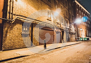 Empty urban alley at night