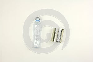 Empty used plastic bottle and tin can, white background, garbage  and pollution environmental problem