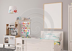 Empty vertical picture frame on gray wall in modern child room. Mock up interior in contemporary, scandinavian style