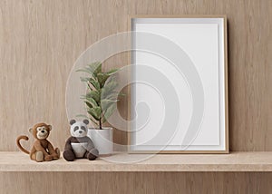 Empty vertical picture frame standing on shelve in modern child room. Mock up interior in contemporary style. Free, copy