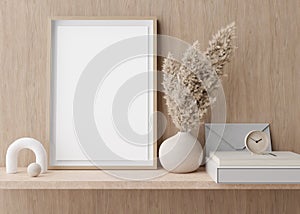 Empty vertical picture frame standing on shelve in modern room. Mock up interior in contemporary style. Free, copy space