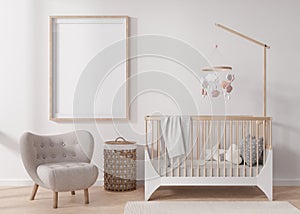 Empty vertical picture frame on white wall in modern child room. Mock up interior in scandinavian style. Free, copy