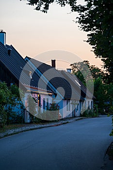 Empty village street in SkÃ¥ne Scania Sweden during summer sunset