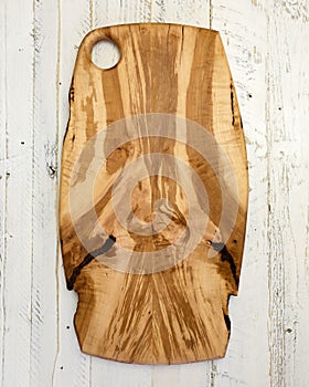 Empty Vintage Cutting Board on White Rustic Wood Background