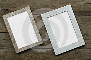 Empty Vintage photo frame on old wood background