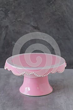 Empty vintage pink cake platter