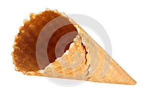 Empty waffle ice cream cone. Isolated on white.