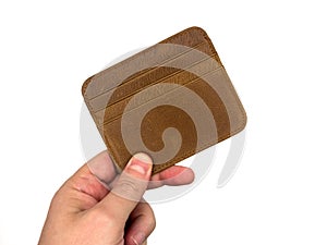 An Empty wallet in the hands of a man  on white background, wealth