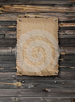 Empty wanted poster on plank wood wall photo