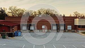 Empty Warehouse Loading Dock and Parking Lot