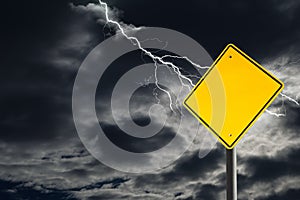 Empty Warning Sign Against Cloudy and Thunderous Sky