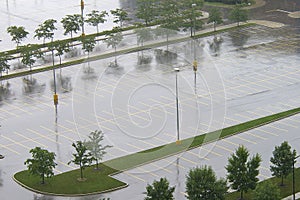 Empty wet parking lot in summer