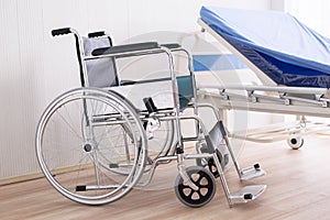 Empty wheel chair for patient in room at hospital