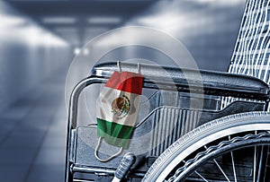 Empty Wheelchair in Hallway of Mexican Hospital or Long Term Care Home