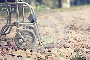 Empty wheelchair parked in hospital