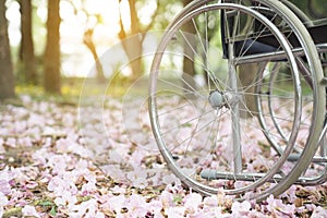 Empty wheelchair parked in hospital