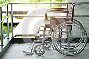Empty wheelchair parked in hospital, healthy and medicine concept