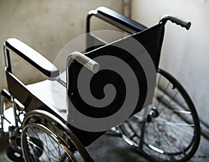 Empty wheelchair in a room