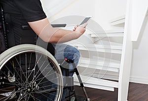 Empty wheelchair and stairs