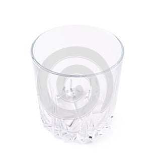 Empty whiskey tumbler glass isolated