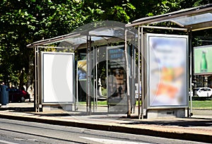 Empty white ad panel and light box for mockup at busstop