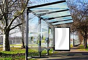 Empty white ad panel and light box for mockup at city transit busstop