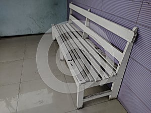 Empty white bench. usually used for queuing in public facilities such as public health services. photo