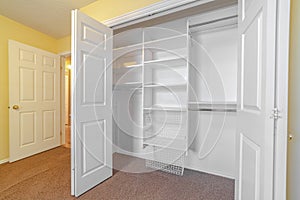 Empty white built in closet or wardrobe interior