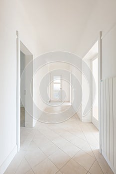 Empty white corridor