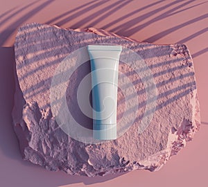 Empty white cosmetic cream tube on pink mock up background