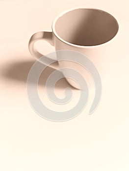 Empty white cup on a light background. Cup with place for text. Copyspace