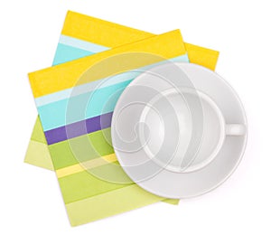 Empty white cup on placemat