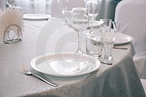 Empty white dinner plate on a table