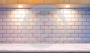 Empty white marble counter with illuminated led lamps lighting on white tile wall and wooden wall cabinet in modern kitchen room