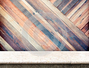 Empty White marble table at blurred pale plank wooden wall in ba