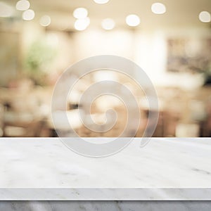 Empty white marble table over blur restaurant background, product and food display montage