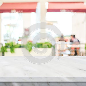 Empty white marble table over blur restaurant background, product and food display montage