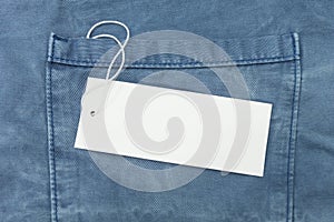 Empty white paper tag of jean, close up